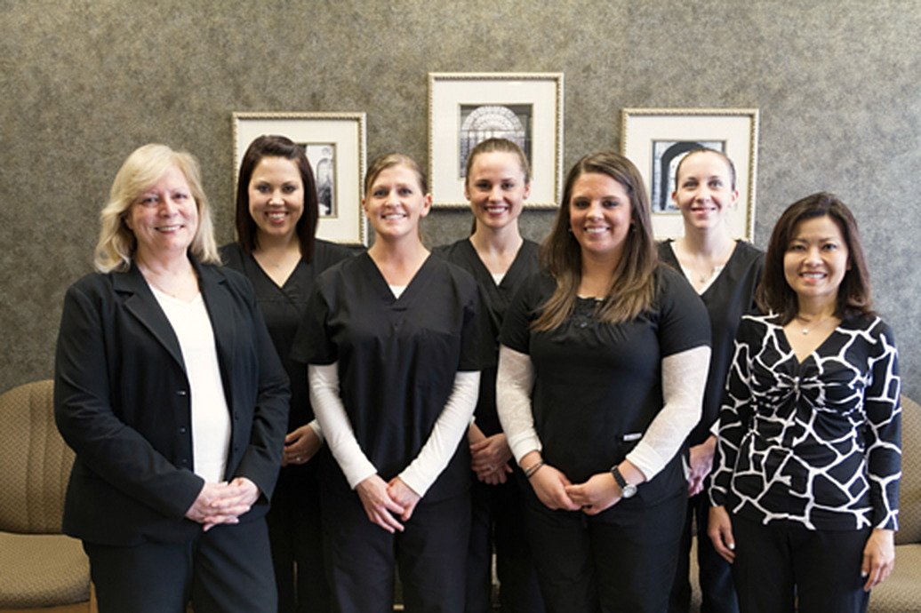 The Gentle Dentistry team with Dr. Christine Hoang in the office waiting area