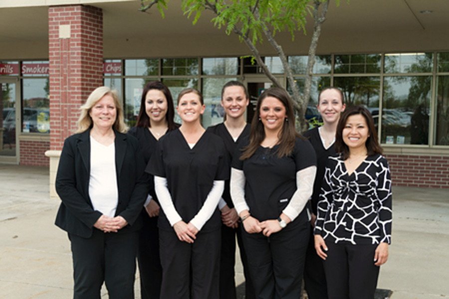 The Gentle Dentistry team with Dr. Christine Hoang outside the office